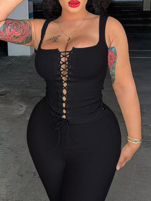 Black ribbed lace-up tank top and capri pants set with a square neckline.