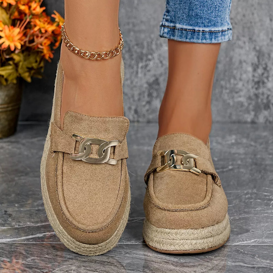 Chic brown round toe platform loafers with gold chain detail and espadrille sole.
