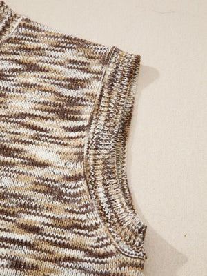 Horseshoe knit sweater vest in brown and white marled acrylic with a crew neck.