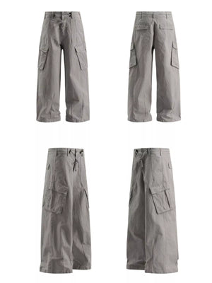 Light gray relaxed fit drawstring cargo pants with multiple pockets.