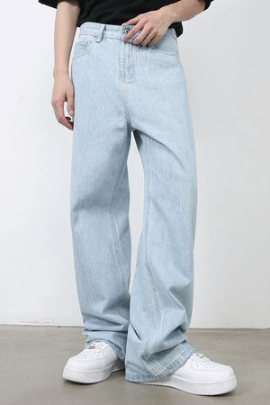 Baggy light blue denim palazzo jeans with button fly and wide leg.
