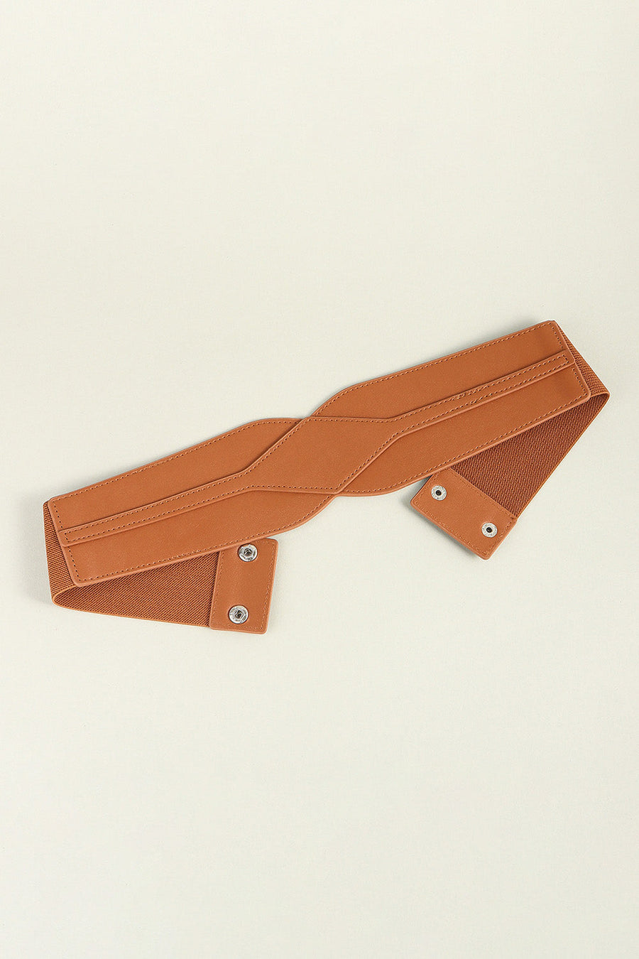 Caramel elastic belt with sculpted faux leather overlay and snap closure