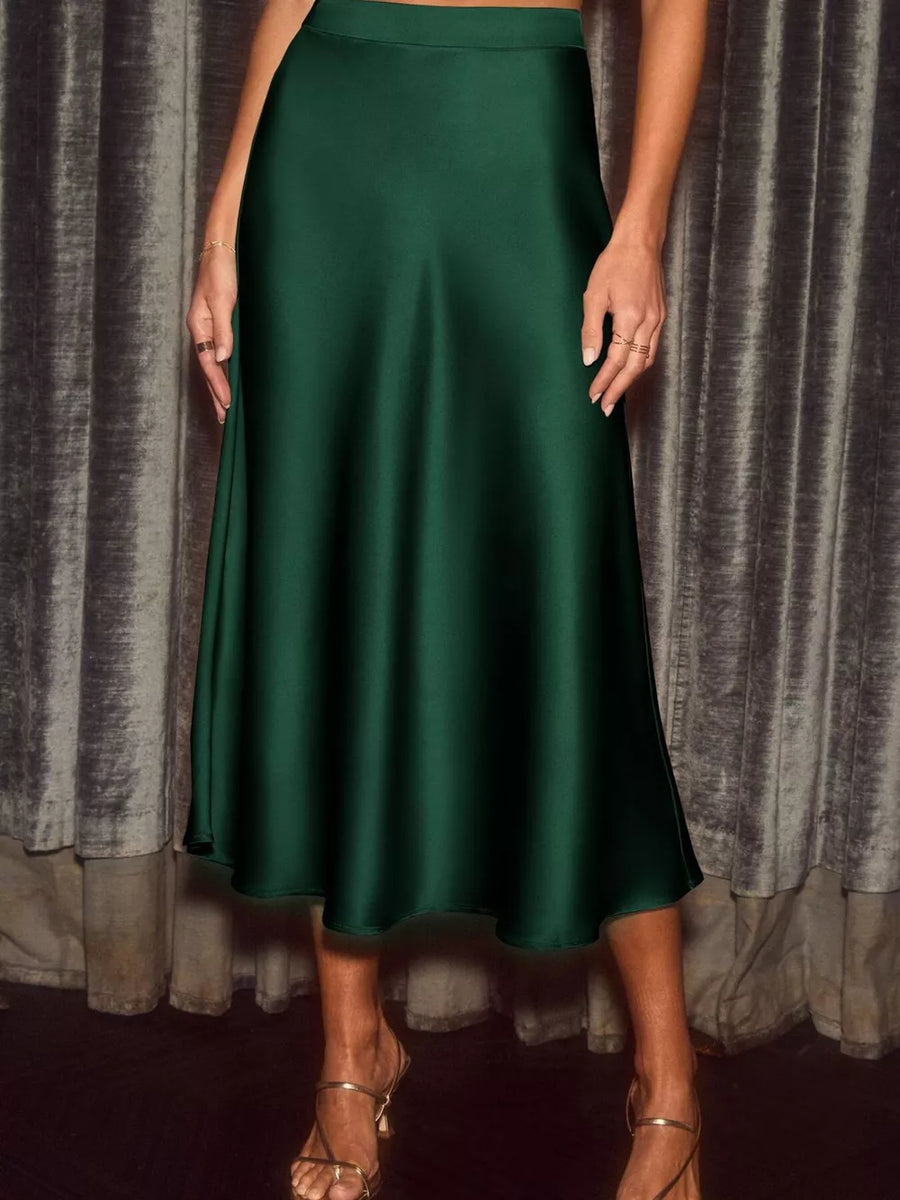 Dark green satin midi skirt with a flowing A-line cut.