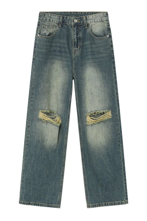 Distressed knee rip wide-leg jeans in medium wash cotton with a faded look.