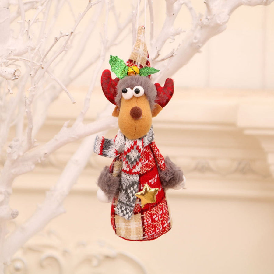 Festive fabric reindeer ornament with red and white patterned sweater and scarf, gold star detail.