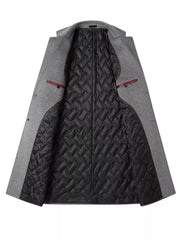 Men's grey classic overcoat with quilted black lining and red trim detail.