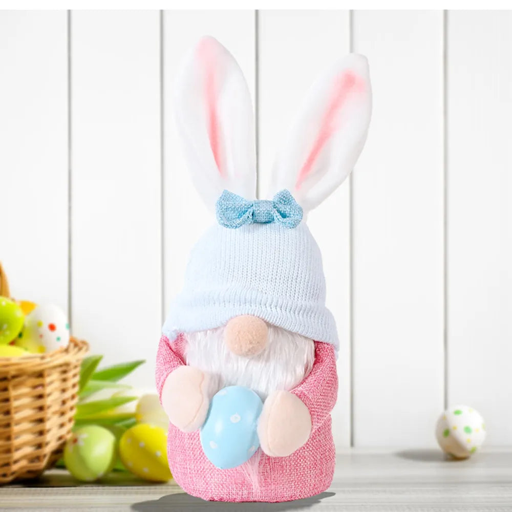 Pink bunny ear gnome decoration with blue bow and egg