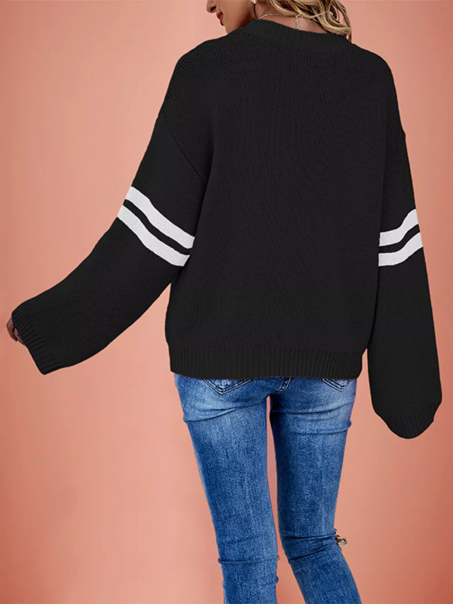 Black pullover sweater with hip-length and pullover