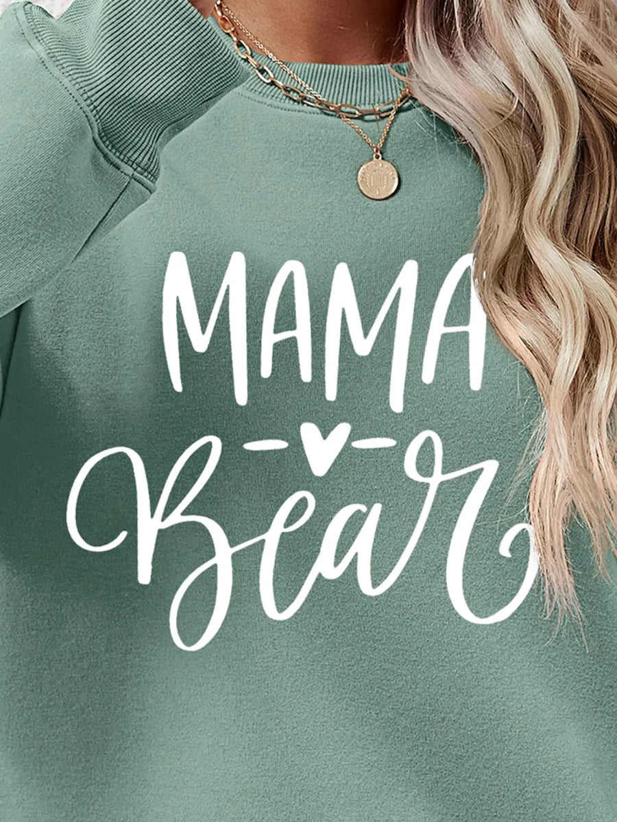Sage Mama Bear graphic sweatshirt with crew neck and long sleeves.