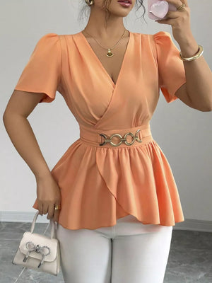 Orange polyester surplice blouse with belted waist and short puff sleeves
