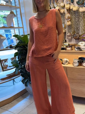 Apricot relaxed fit tank and wide-leg pants set with side slits and a round neckline.