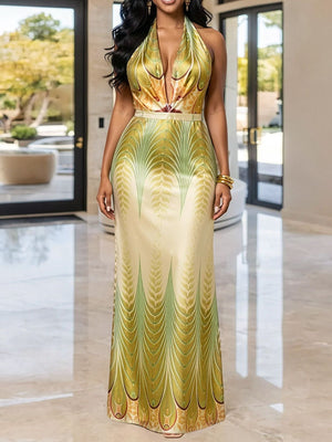 gold maxi dress with leaf-print and halter
