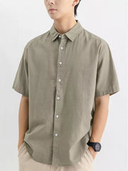 Men's short sleeve button-up shirt in Army Green cotton, classic collar, casual fit.