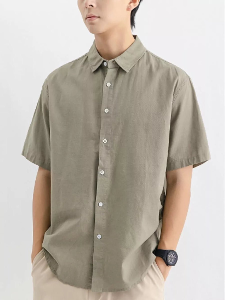 Men's short sleeve button-up shirt in Army Green cotton, classic collar, casual fit.