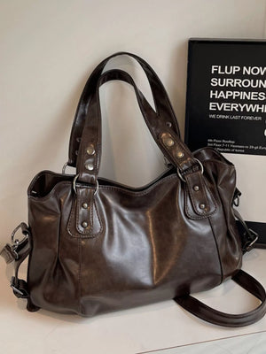Large vintage brown PU leather shoulder bag with silver hardware and double handles.