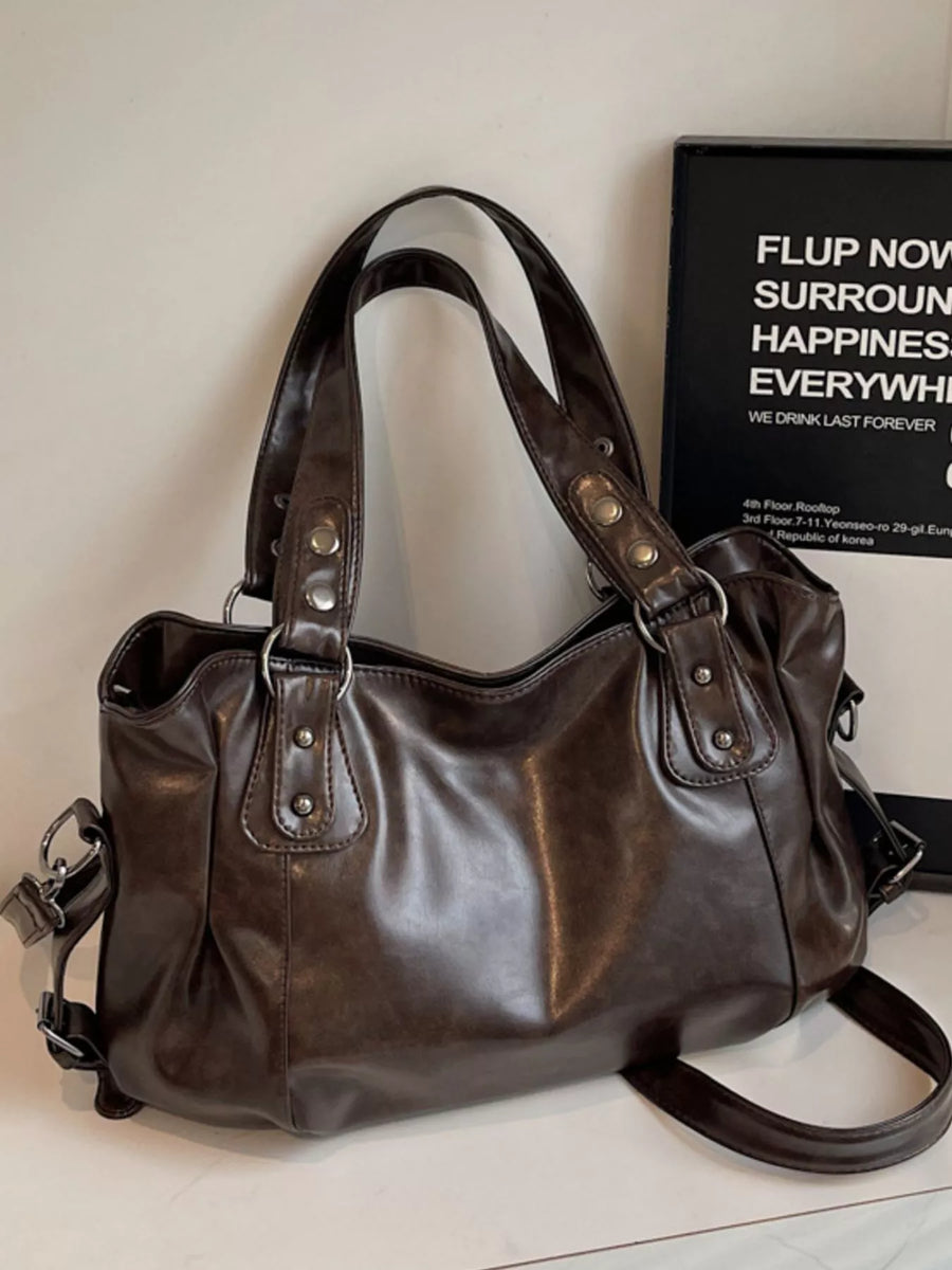 Large vintage brown PU leather shoulder bag with silver hardware and double handles.