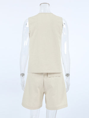 Buttoned vest and shorts set in beige cotton with a classic cut.