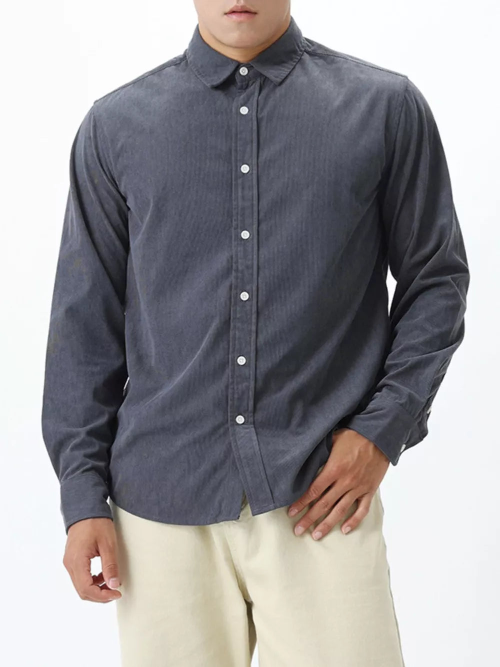 Gray corduroy long sleeve buttoned shirt with a classic collar.