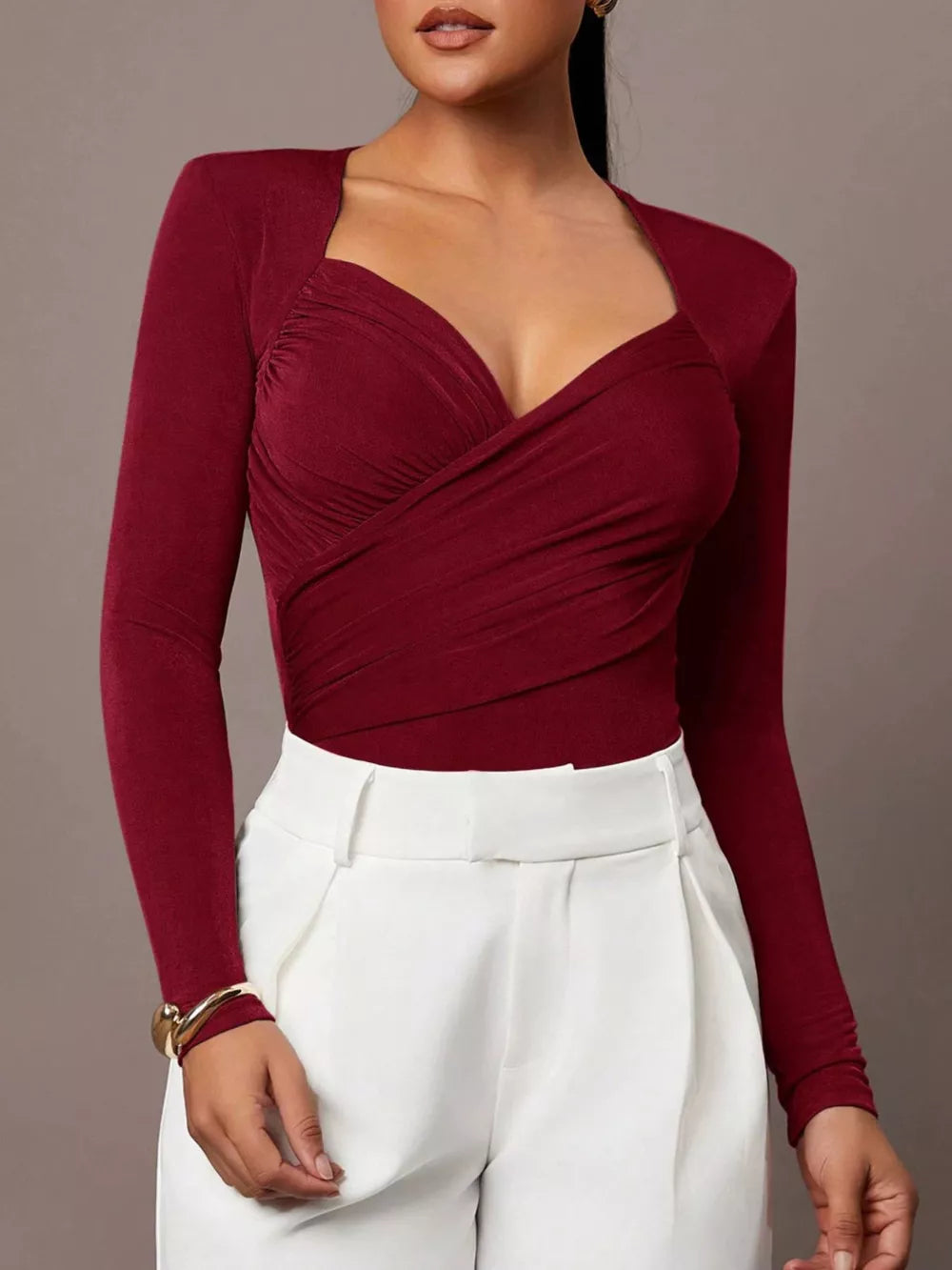 100% polyester Care instructions: Machine wash cold bodysuit in Burgundy with fitted silhouette