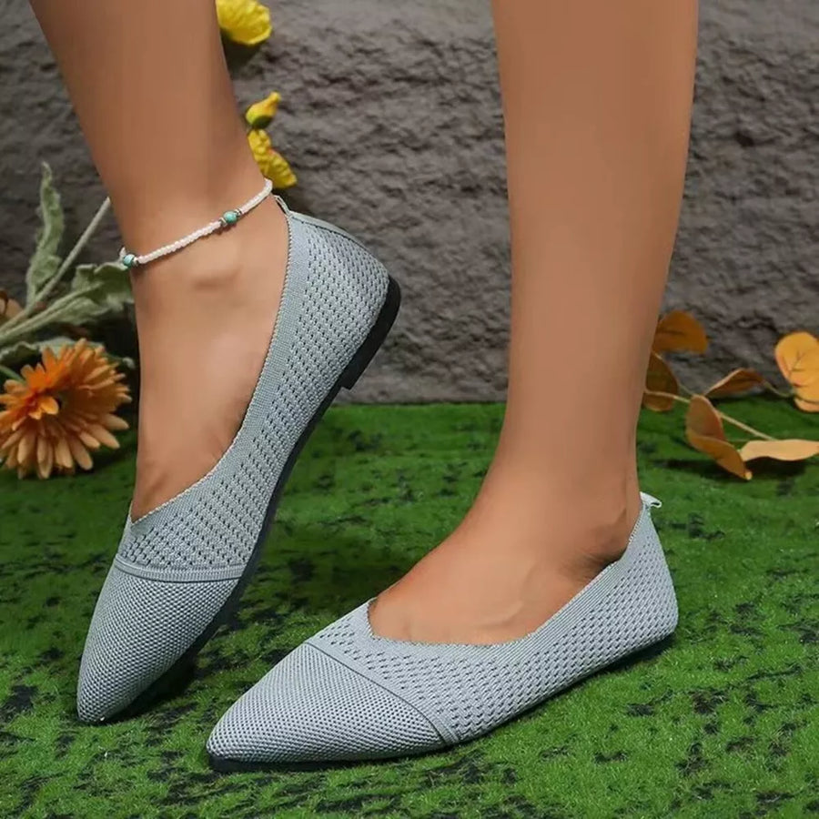Light gray knit pointed toe ballet flats with a subtle textured pattern.
