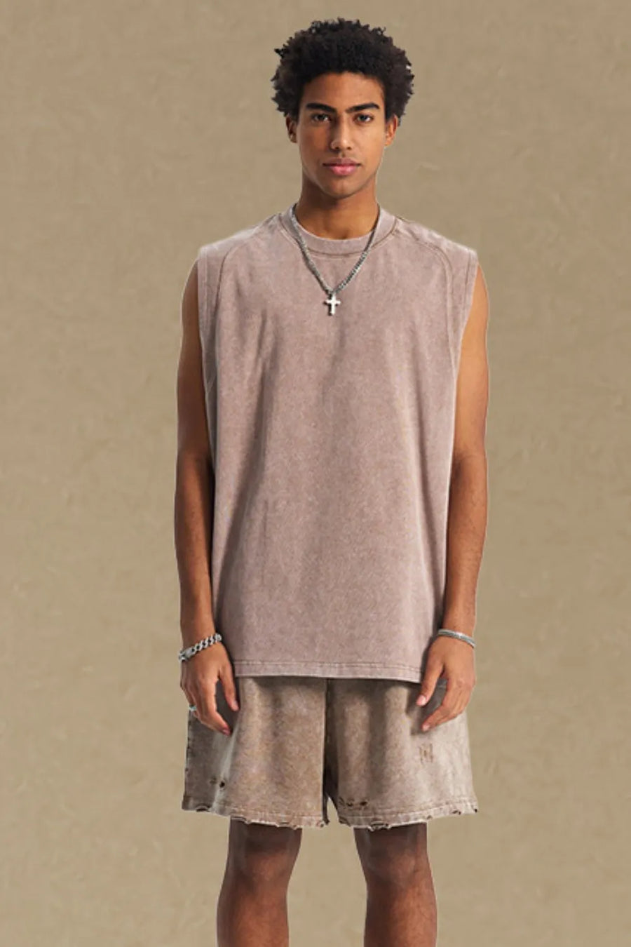 Acid wash relaxed fit tank top in mocha with a crew neck and sleeveless design.