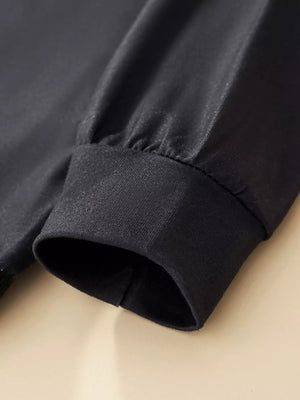 Black baby sleepwear set cuff detail