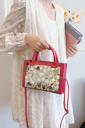 Hot Pink structured mini bag with large sequin embellishments and a crossbody strap.