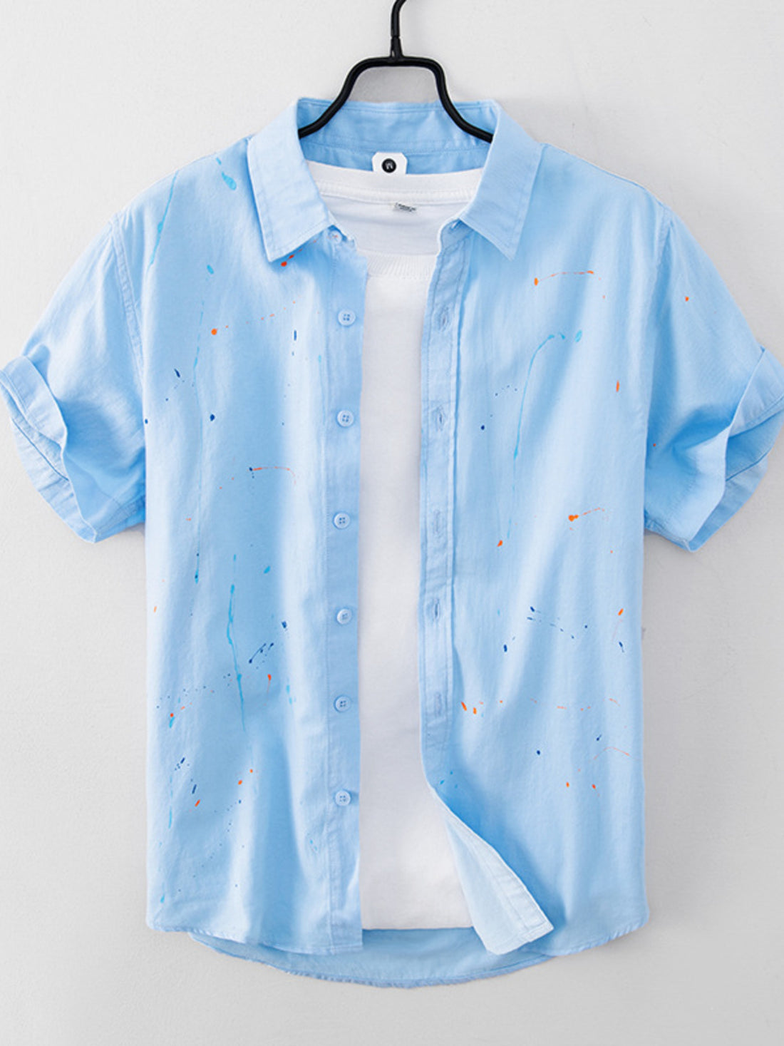 Pink button-up shirt with hip-length and button-front