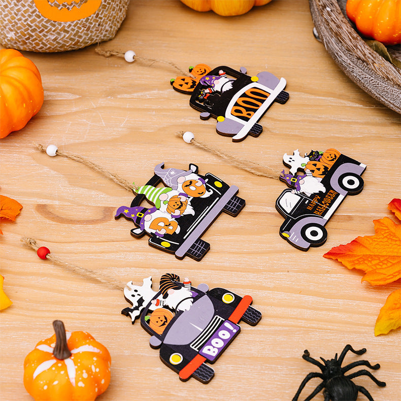 Halloween car-shaped gnome ornaments in multicolor with festive designs and hanging twine.