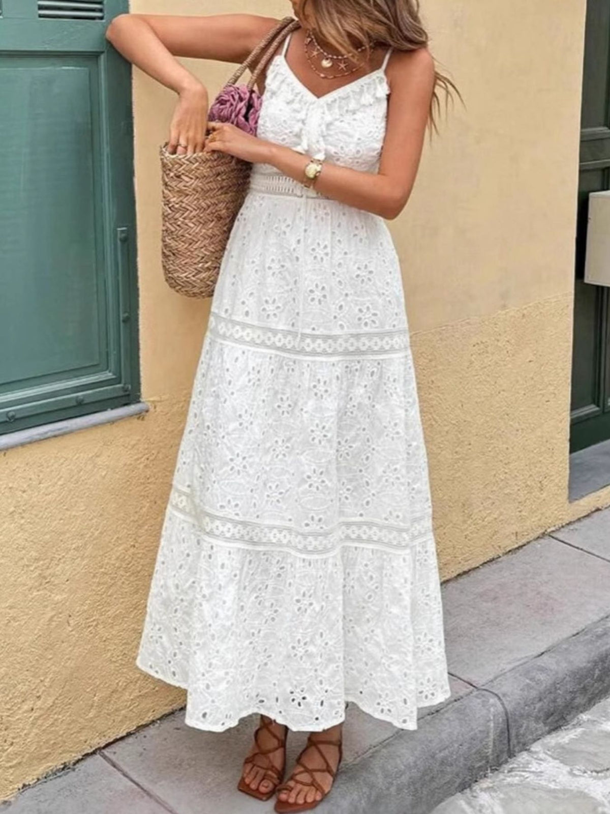 White eyelet embroidered cami maxi dress with lace trim and tiered skirt.
