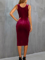 Burgundy velvet midi dress with slit, bodycon fit, sleeveless, round neck.
