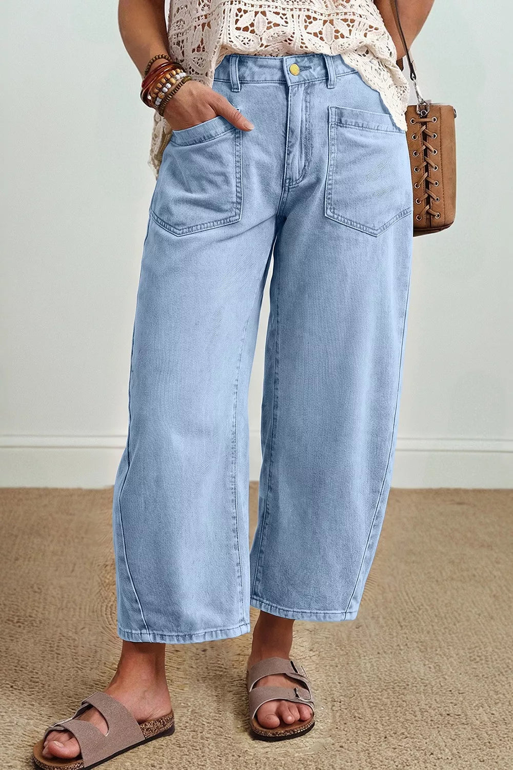light blue wide-leg jeans with cropped and button-front, zip-front