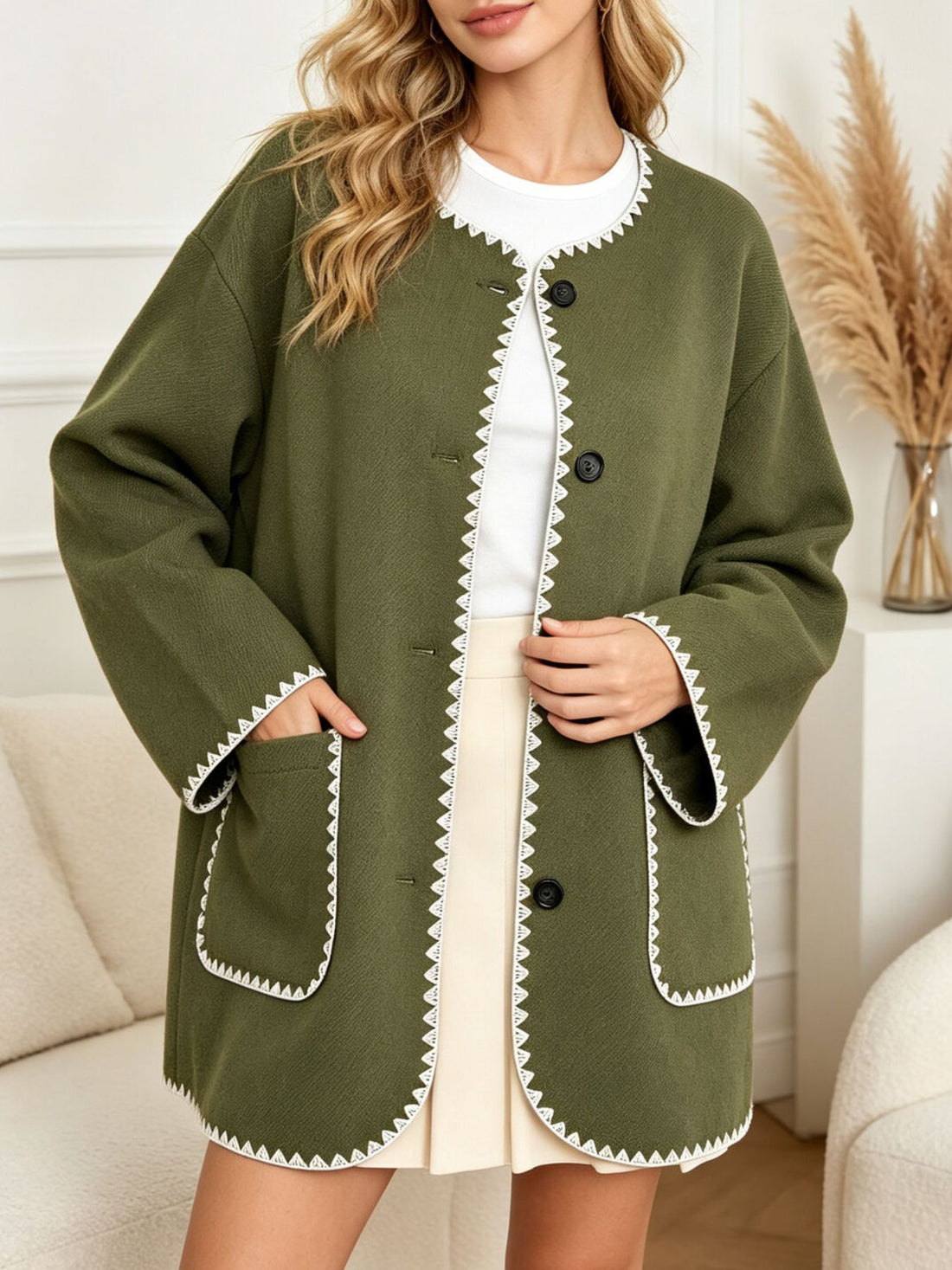 blazer in olive green featuring buttoned and relaxed fit