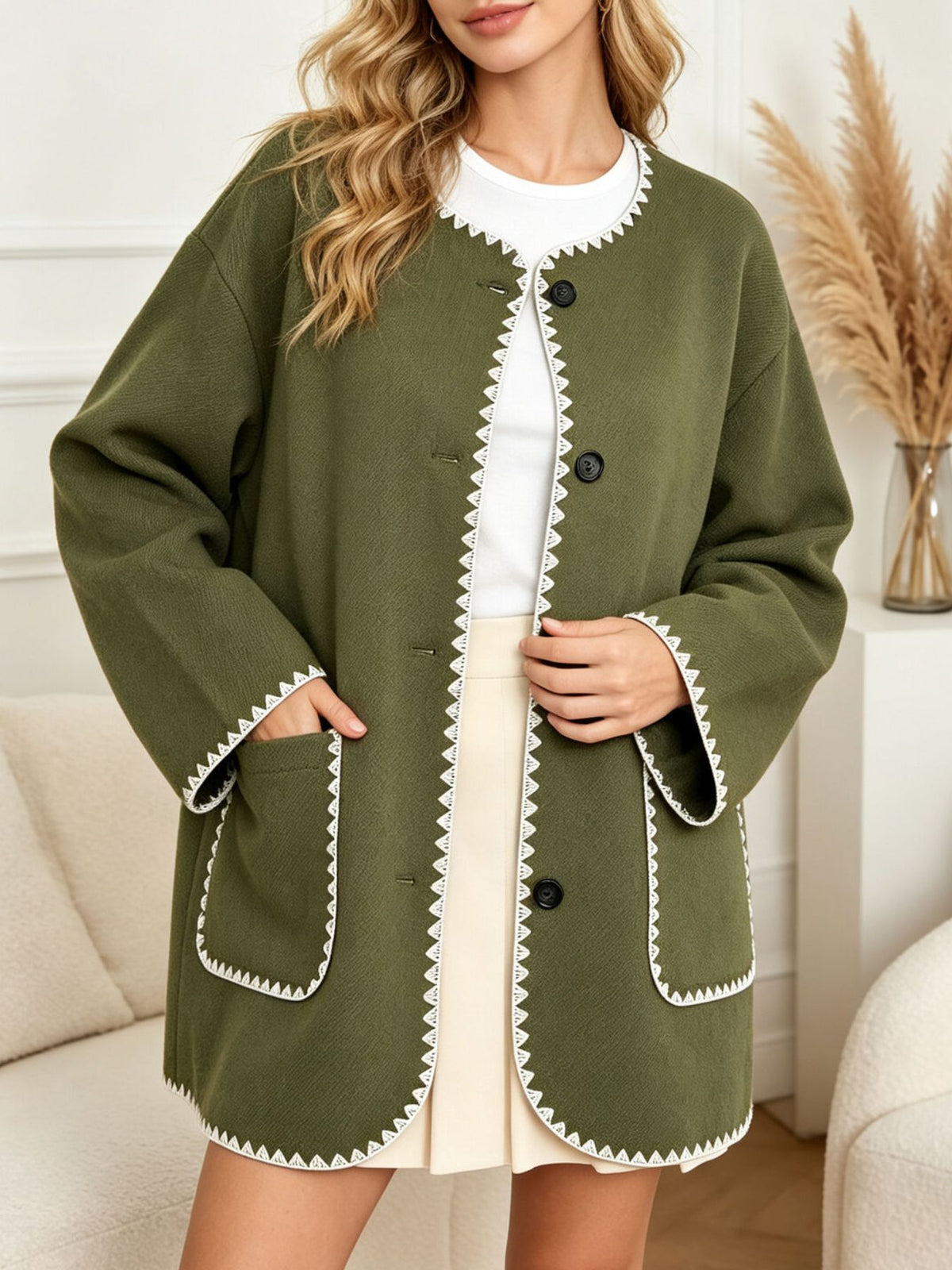blazer in olive green featuring buttoned and relaxed fit