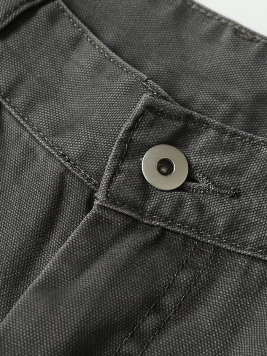 Grey cargo pants with buckle detail and pockets