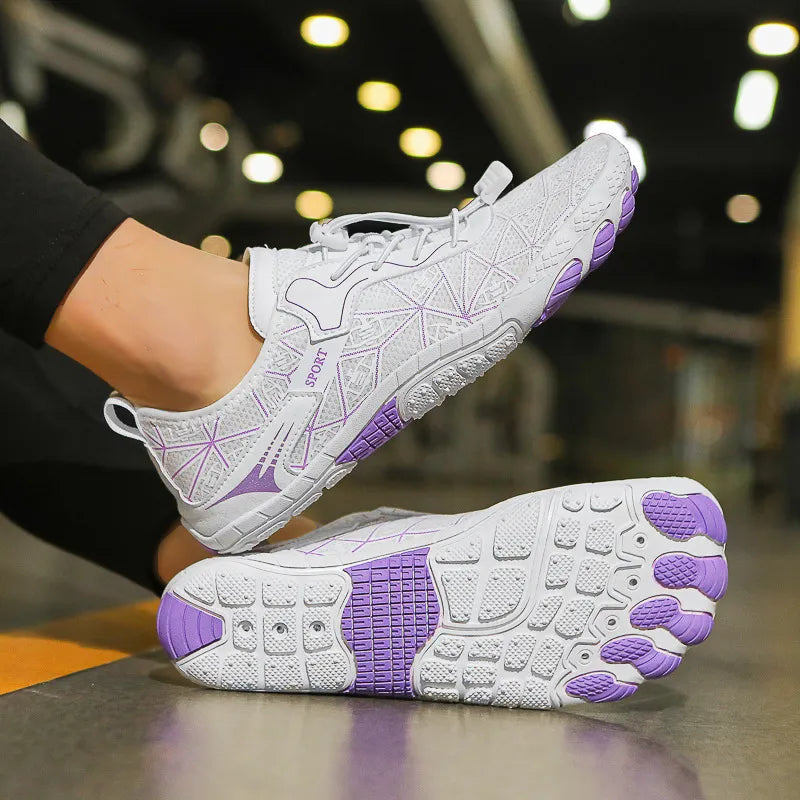 White mesh barefoot water shoes with purple geometric pattern and sole.