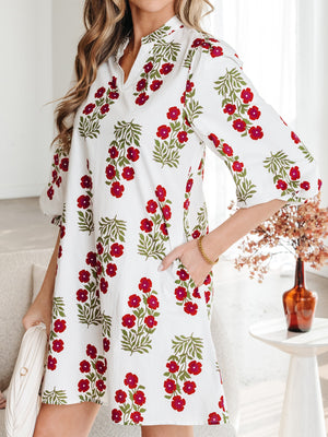 V-neck mini dress in white with red floral print, cotton, with pockets.