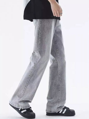 Men's relaxed fit light grey washed cotton jeans with a vintage-inspired look.