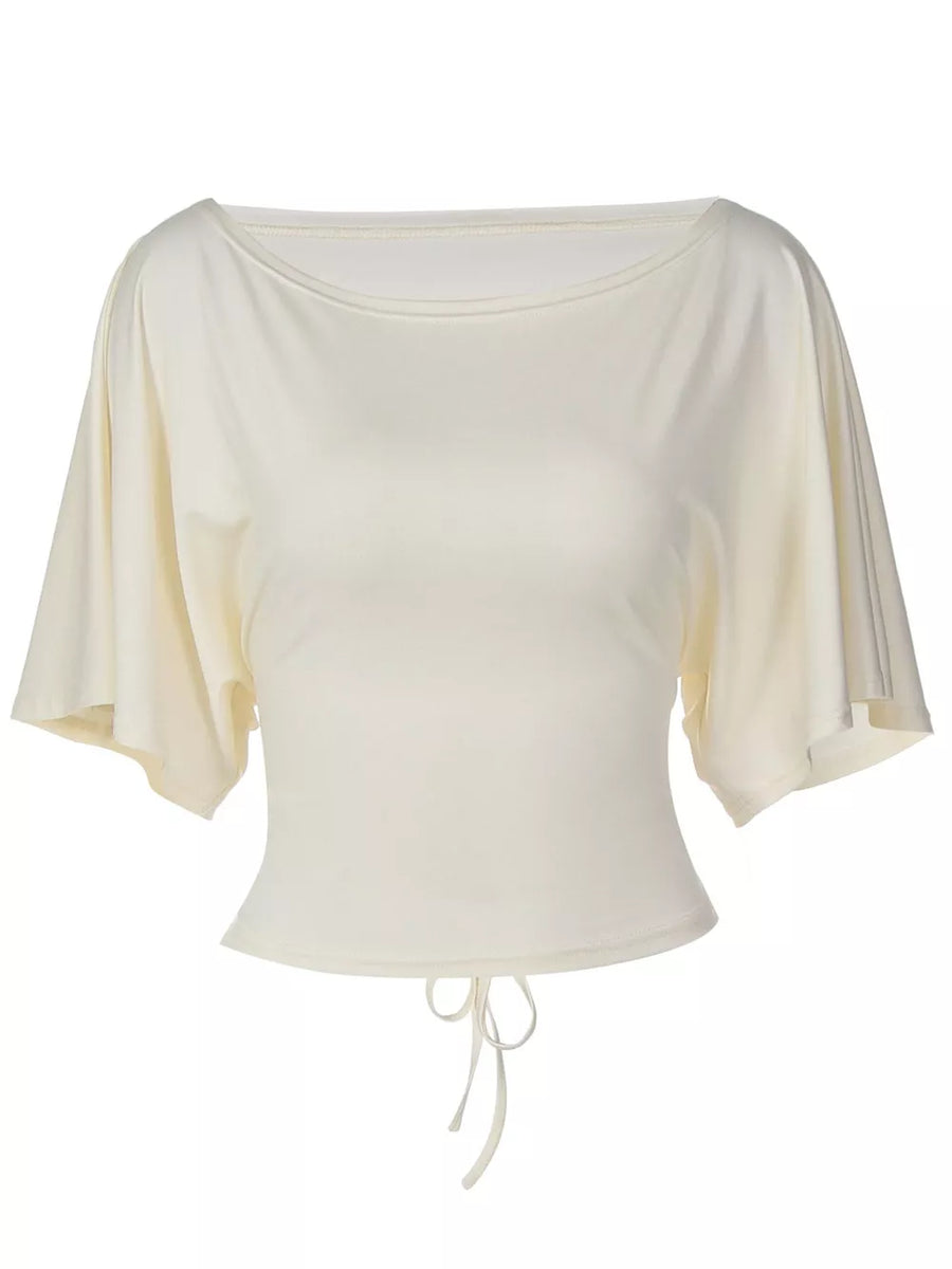Apricot draped tie-front short sleeve t-shirt with dolman sleeves and a boatneck.