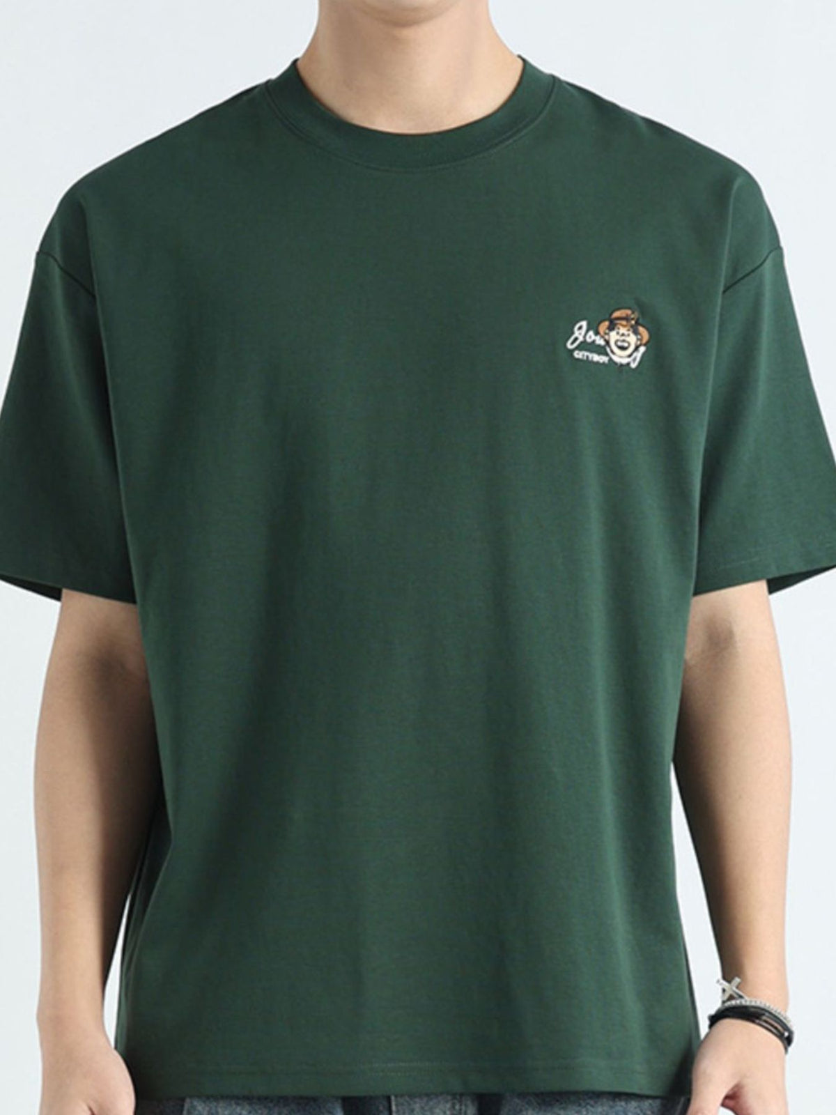 Men's dark green cotton t-shirt with a round neck and small embroidered monkey graphic.
