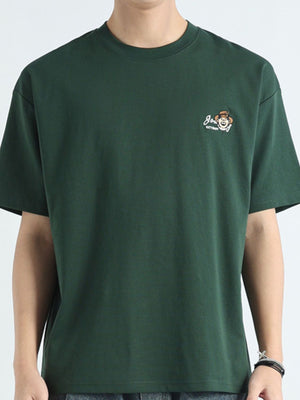 Men's dark green cotton t-shirt with a round neck and small embroidered monkey graphic.