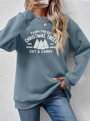 Misty Blue crewneck sweatshirt with "Farm Fresh Christmas Trees" graphic print and crew neckline.