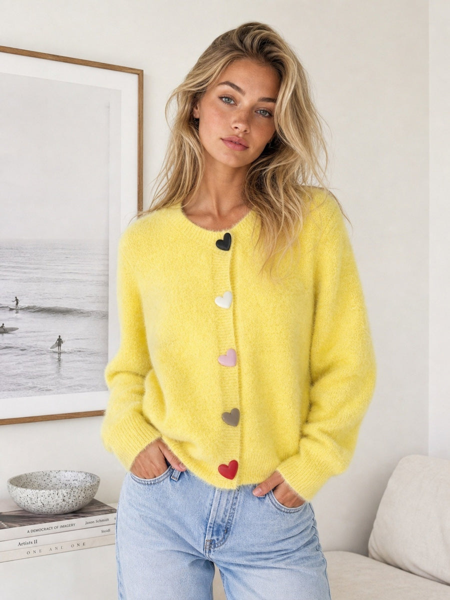 Yellow cardigan with hip-length and button-front