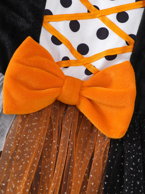dress in orange with polka dot and mesh
