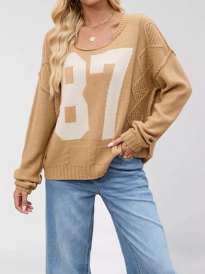 pullover sweater in ivory with graphic print and cable-knit
