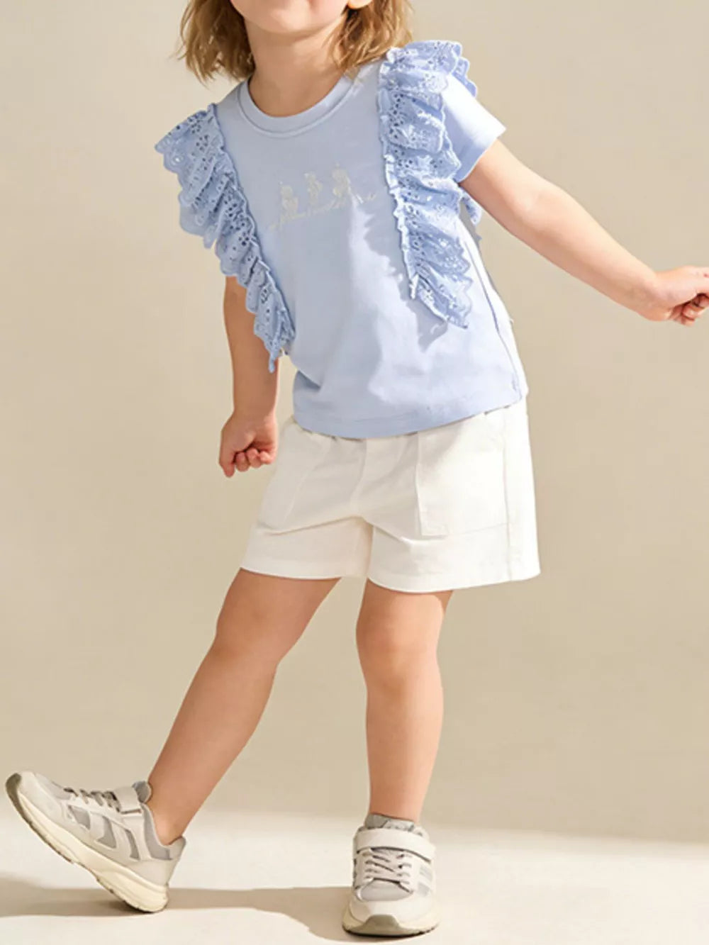 Light blue cotton t-shirt with ruffled lace sleeves and a crew neck.