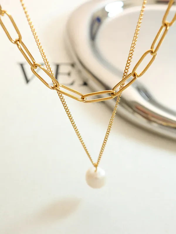 Gold layered necklace with paperclip chain and pearl pendant