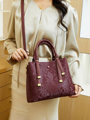 handbag featuring snakeskin in Wine Red with PU Leather Imported Size &amp texture