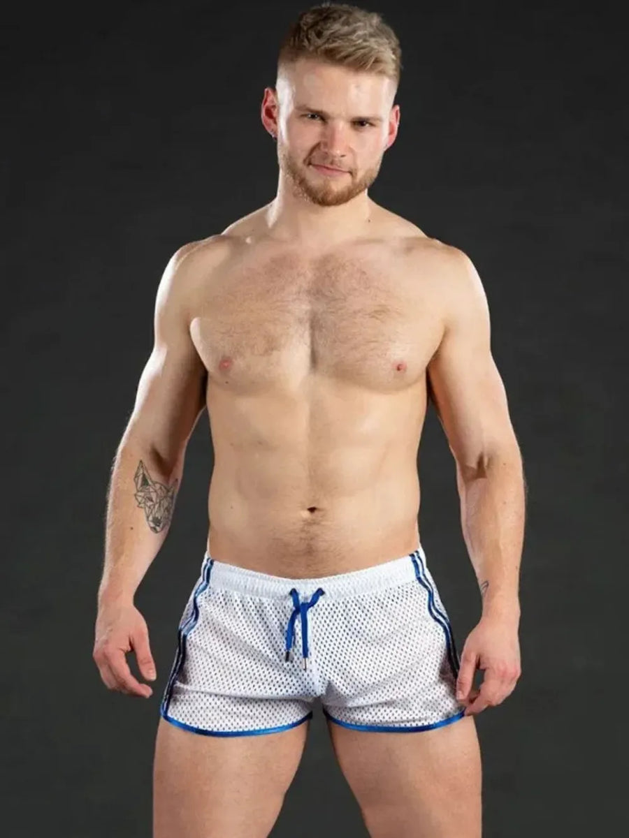 White athletic mesh shorts with royal blue trim and drawstring
