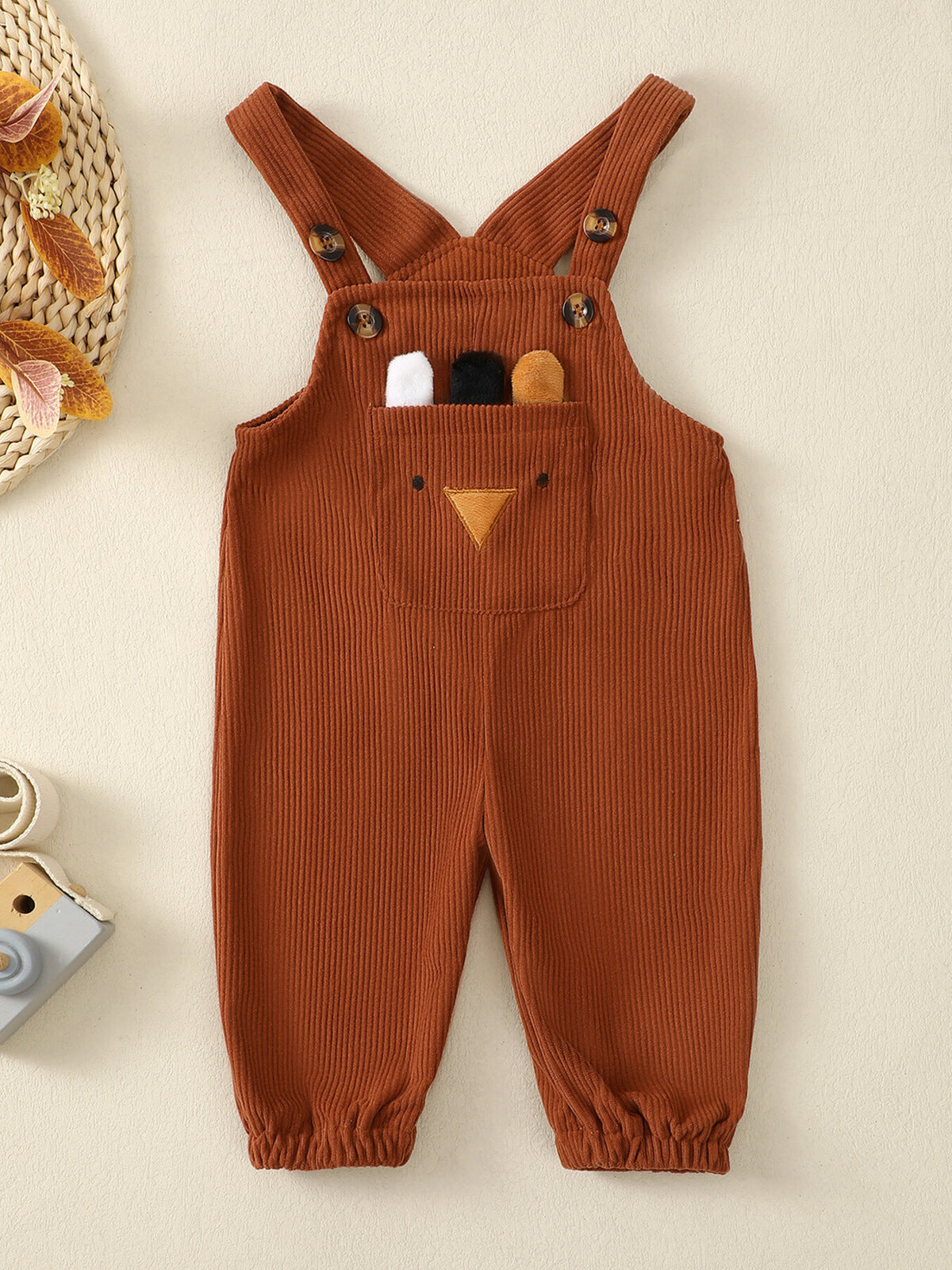 Kids brown corduroy overalls with animal applique pocket and adjustable straps